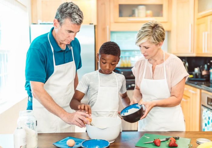 Family baking together in a kitchen, bonding over a fun cooking activity.