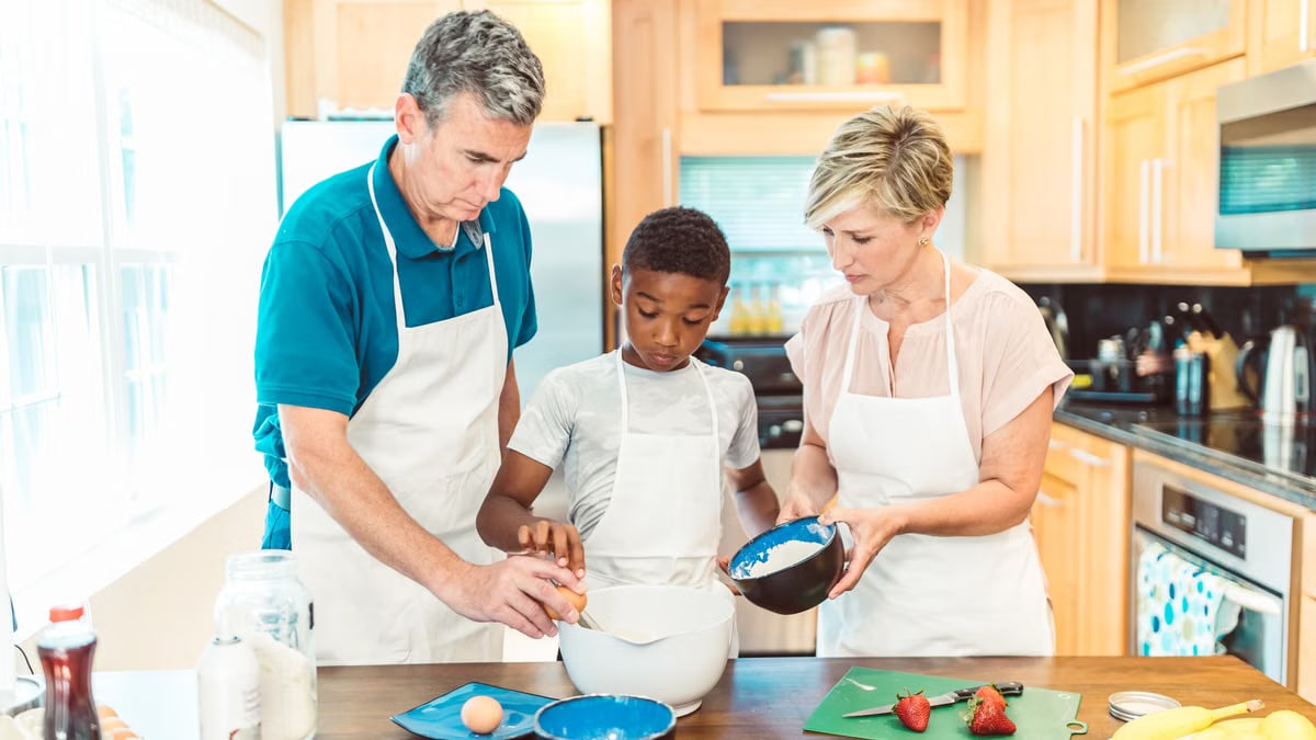 Family baking together in a kitchen, bonding over a fun cooking activity.
